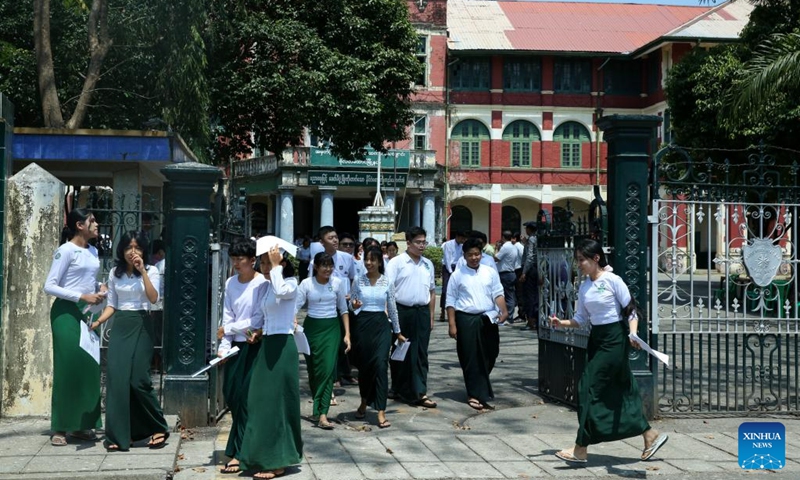 Students leave a high school after a final matriculation exam for the academic year 2023-24 in Yangon, Myanmar, March 11, 2024(Photo: Xinhua)