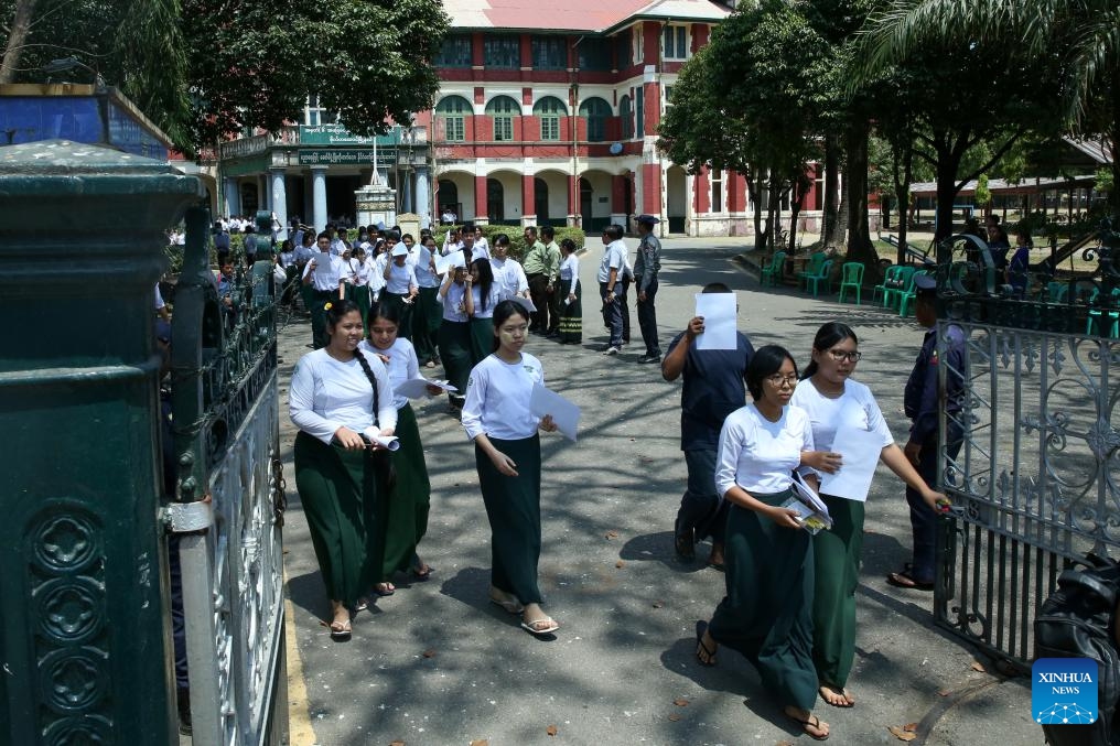 Students leave a high school after a final matriculation exam for the academic year 2023-24 in Yangon, Myanmar, March 11, 2024.(Photo: Xinhua)