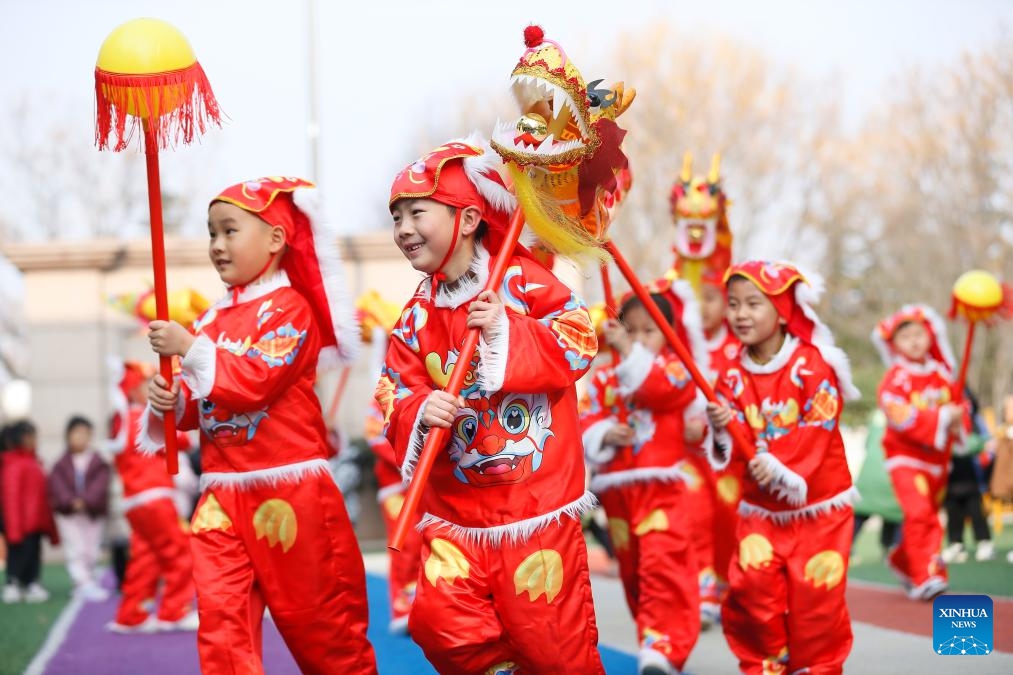 Children perform dragon dance at a kindergarten in Jimo District of Qingdao, east China's Shandong Province, March 11, 2024. Various celebrations were held across the country for Longtaitou, a traditional day for a new haircut after the Spring Festival. The day of Longtaitou, which literally means dragon raises head, falls on the second day of the second lunar month.(Photo: Xinhua)