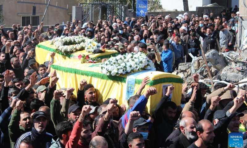 People carry the caskets of four members of one family killed in an Israeli airstrike during a funeral procession in Blida, south Lebanon, March 11, 2024.(Photo: Xinhua)