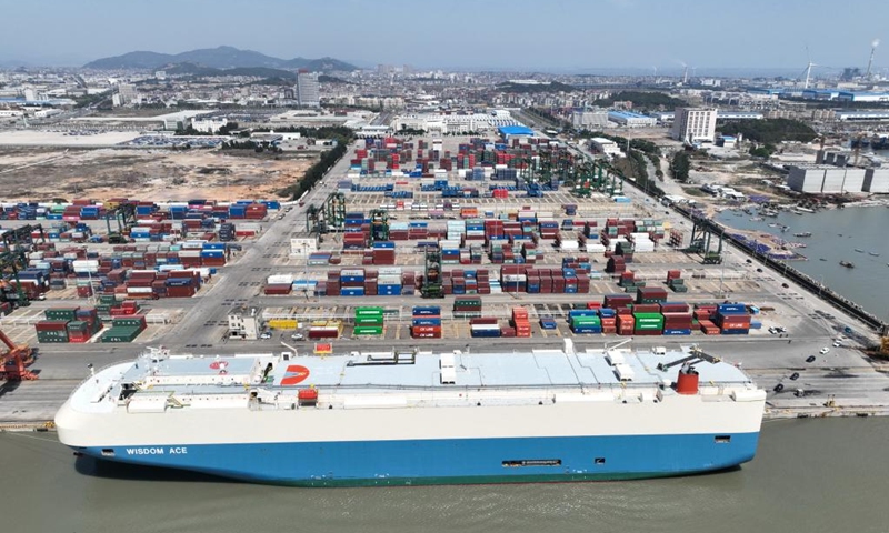 An aerial drone photo taken on March 12, 2024 shows vehicles for export being loaded into a ro-ro cargo vessel at Jiangyin terminal of Fuzhou Port in Fuzhou, southeast China's Fujian Province.(Photo: Xinhua)