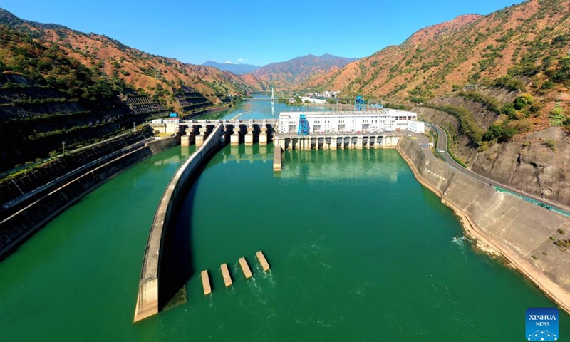 An aerial drone photo taken on Nov. 25, 2022 shows a hydropower station of the Yalong River basin hydro-wind-photovoltaic multi-energy power base in southwest China's Sichuan Province.(Photo: Xinhua)