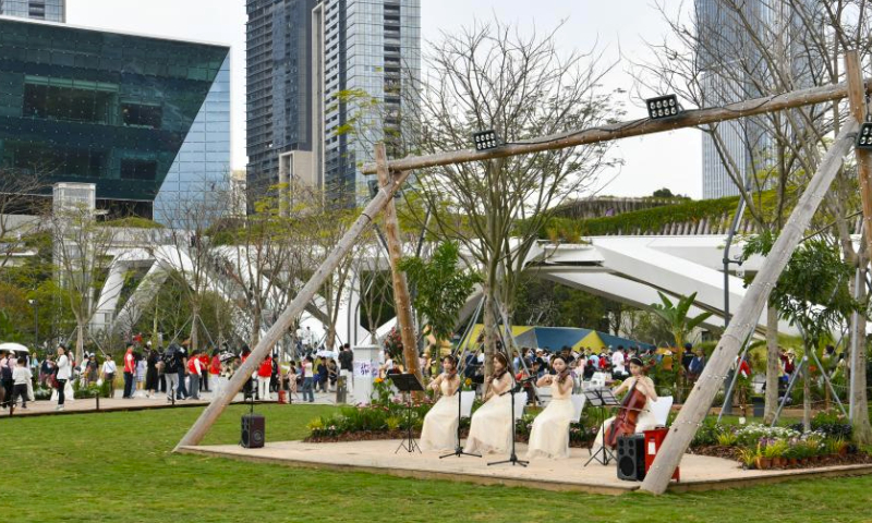 This photo taken on March 23, 2024 shows a musical instrument performance at the Greater Bay Area Flower Show in Shenzhen, south China's Guangdong Province. The Greater Bay Area Flower Show kicked off here on Saturday. Covering an exhibition area of more than 38,000 square meters, the event boasts 44 diverse gardens and will last until April 1. (Xinhua/Liang Xu)