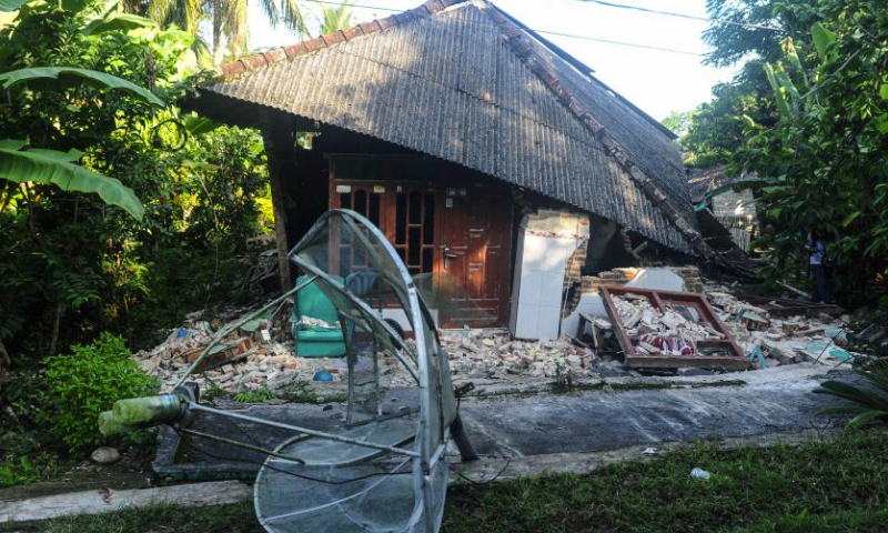 A damaged house is pictured after earthquake in Tambak village of Bawean Island, East Java, Indonesia, March 24, 2024. An earthquake measuring 6.0 on the Richter scale struck off Indonesia's province of East Java on Friday without triggering a tsunami, the country's meteorology, climatology and geophysics agency said. (Photo by Sahlan Kurniawan/Xinhua)