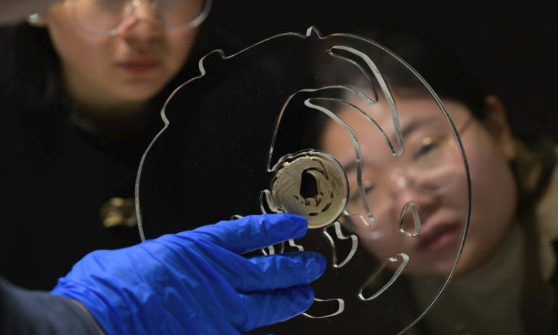 Staff members make preparations for display of the jade phoenix at the Panlongcheng Site Museum in Wuhan, central China's Hubei Province, March 30, 2024. The jade phoenix, which has been kept by the National Museum of China, was introduced to the exhibition Mythological Jade of Shijiahe Culture at the Panlongcheng Site Museum in Wuhan on Saturday.

This is the first time that the jade phoenix has returned to Hubei since it was unearthed at the Shijiahe site in Tianmen of Hubei in 1955. (Xinhua/Hu Jingwen)