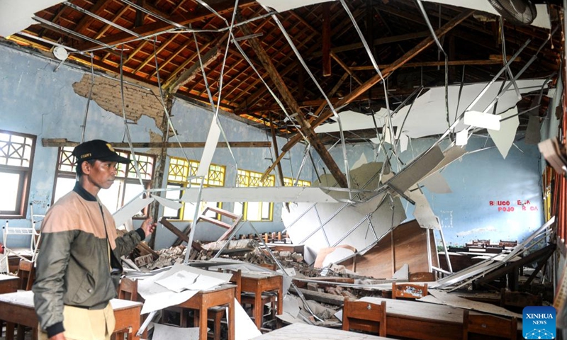 A man checks the situation of a quake damaged classroom in Bawean Island in East Java, Indonesia, March 25, 2024. Multiple earthquakes struck off Indonesia's province of East Java last Friday without triggering a tsunami. Indonesia, an archipelagic nation, is prone to earthquakes as it sits in a vulnerable quake-hit zone, called the Pacific Ring of Fire.(Photo: Xinhua)