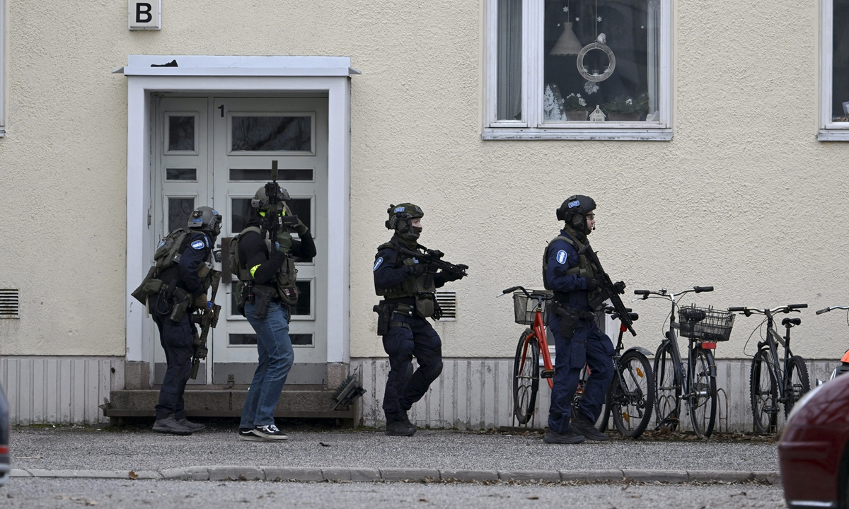 Finnish police investigate the scene at Viertola comprehensive school where a child opened fire and killed one and injured two others, on April 2, 2024 in Vantaa, outside the Finnish capital Helsinki. A 12-year-old fellow pupil suspected of the attack was taken into custody, police said. Photo: AFP