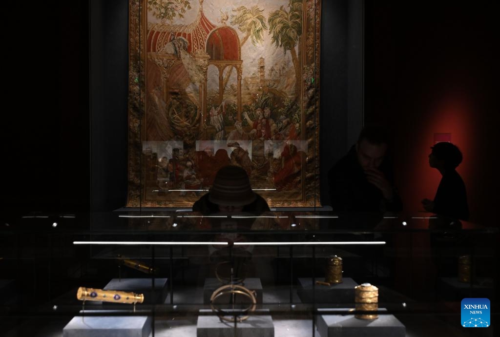 Visitors watch an exhibition at the Palace Museum in Beijing, capital of China, April 1, 2024. The exhibition The Forbidden City and the Palace of Versailles: Exchanges Between China and France in the 17th and 18th Centuries opened at the Palace Museum in Beijing on Monday, showcasing about 200 cultural relics.(Photo: Xinhua)