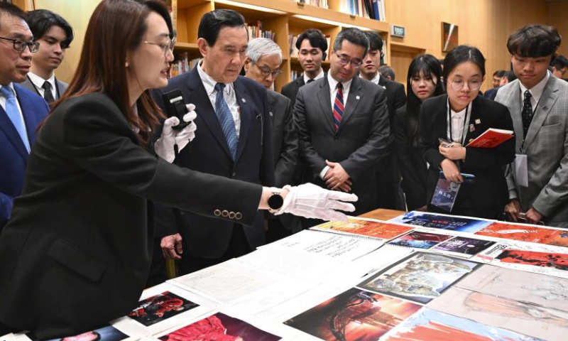 Ma Ying-jeou, former chairman of the Chinese Kuomintang party, and members of a delegation of young people from Taiwan visit the resource center of the National Center for the Performing Arts (NCPA) in Beijing, capital of China, April 7, 2024. Ma and the Taiwan youth delegation led by him visited the NCPA on Sunday. (Xinhua/Chen Yehua)