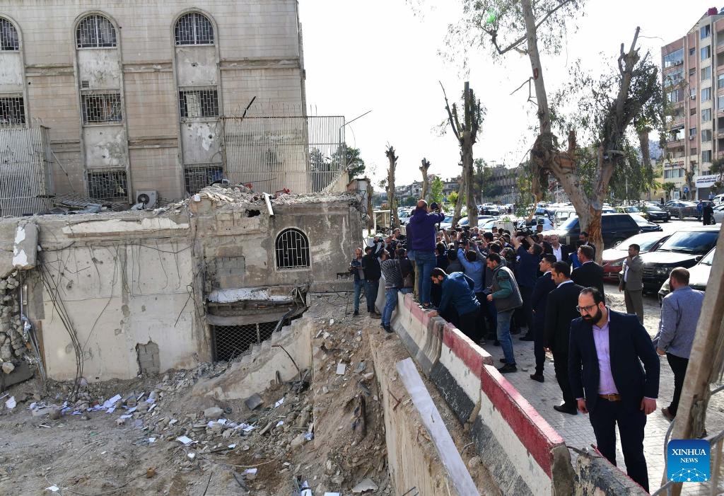 Iranian Foreign Minister Hossein Amir-Abdollahian, Syrian Foreign Minister Faisal Mekdad and other officials check the site of Israeli attack on Iran consulate in Damascus, Syria, on April 8, 2024. Iranian Foreign Minister Hossein Amir-Abdollahian opened a new consulate building in the Syrian capital of Damascus on Monday, following the destruction of the previous consulate by an Israeli strike last week.(Photo: Xinhua)