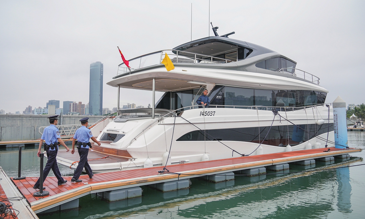 The first yacht participating in the 4th China International Consumer Products Expo pulls into port and moors at a pier in Haikou, South China's Hainan Province on April 9, 2024. The expo, which will take place in Haikou from April 13 to 18,  has attracted more than 3,000 brands from 59 countries and regions. Photo: VCG