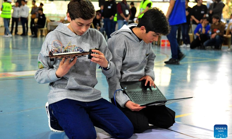 Contestants are pictured at a robotics championship in Damascus, Syria, on April 6, 2024.(Photo: Xinhua)