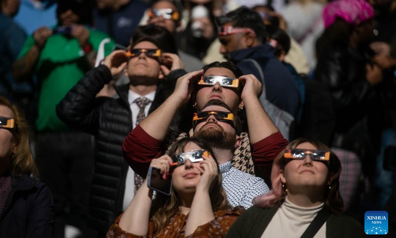 People watch solar eclipse across North America - Global Times