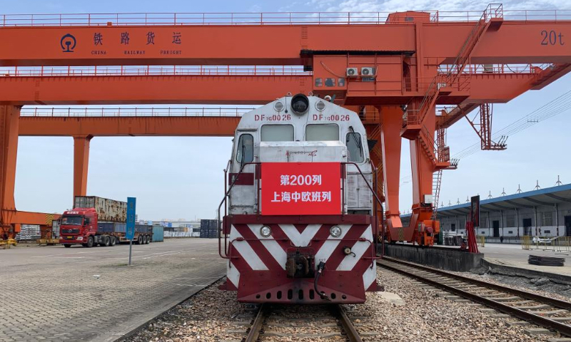 This photo taken on April 19, 2024 shows a China-Europe freight train departing from east China's Shanghai. The freight train loaded with 110 standard containers departed from Minhang station in Shanghai Friday, marking that Shanghai has handled 200 China-Europe freight trains since the city launched the China-Europe freight train service in September 2021. (Xinhua)