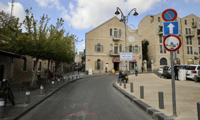 This photo shows a street in Jerusalem on April 14, 2024. (Photo by Jamal Awad/Xinhua)