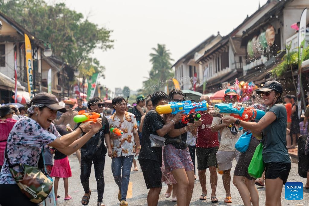 People participate in the celebration of the Songkran Festival in Luang Prabang, Laos, April 16, 2024.(Photo: Xinhua)