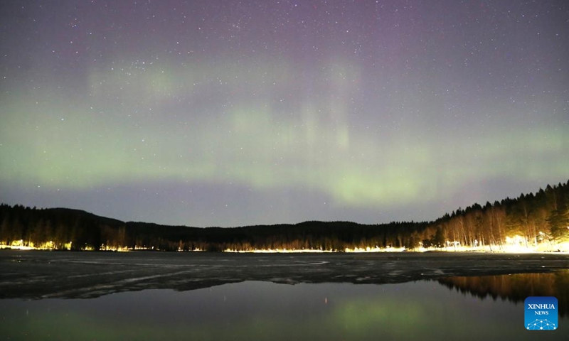 This photo taken on April 17, 2024 shows the northern lights at Sognsvann Lake in Oslo, capital of Norway.(Photo: Xinhua)