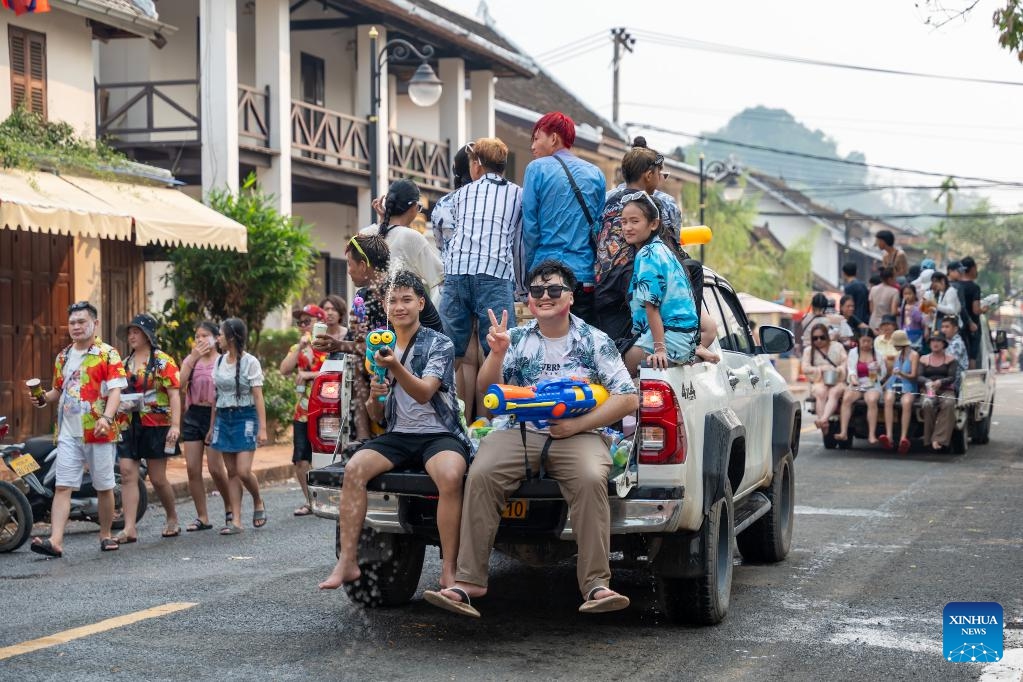 People participate in the celebration of the Songkran Festival in Luang Prabang, Laos, April 16, 2024.(Photo: Xinhua)