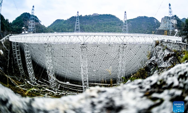 This photo taken on Feb. 26, 2024 shows China's Five-hundred-meter Aperture Spherical Radio Telescope (FAST) under maintenance in southwest China's Guizhou Province. China's Five-hundred-meter Aperture Spherical Radio Telescope (FAST), the world's largest single-dish radio telescope, has identified more than 900 new pulsars since its launch in 2016, its operator said Wednesday. (Photo: Xinhua)