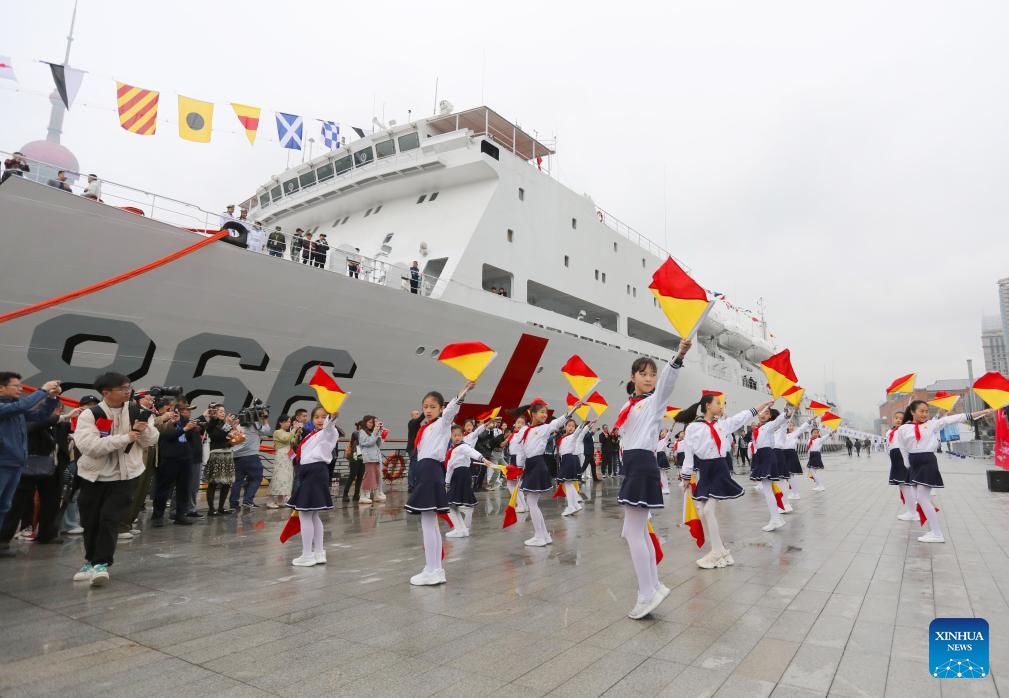 Students perform during an open day event at a port in east China's Shanghai, April 23, 2024. The Chinese People's Liberation Army Navy holds open day events in Shanghai on Tuesday to mark the 75th anniversary of its founding. Visitors could tour the guided-missile destroyer Zibo and hospital ship Peace Ark at the event.(Photo: Xinhua)