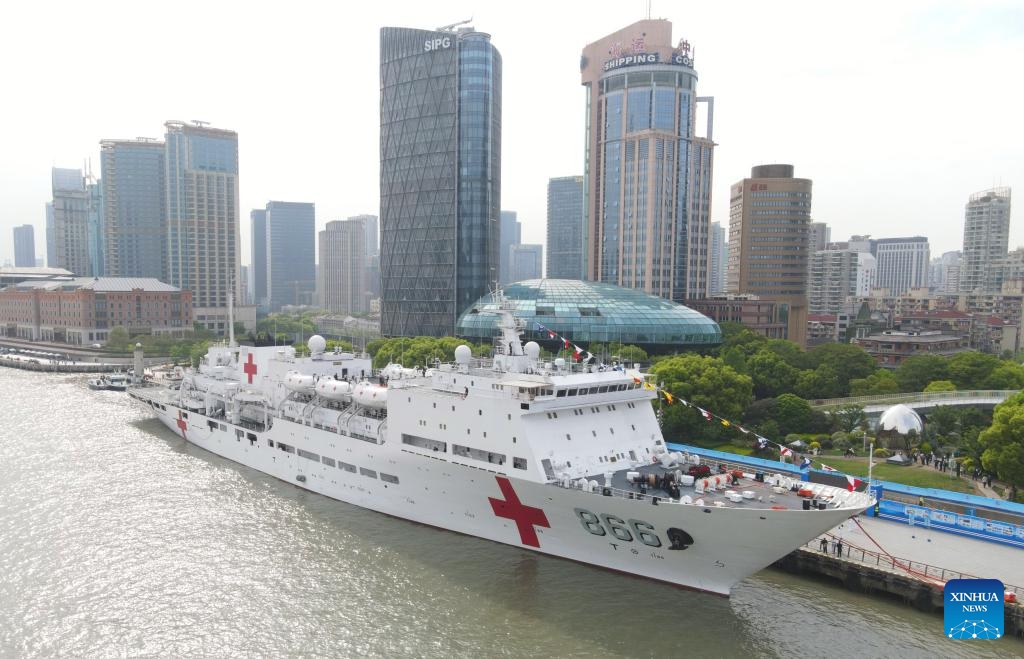 This aerial drone photo shows the naval hospital ship Peace Ark mooring at a port in east China's Shanghai, April 22, 2024. The Chinese People's Liberation Army Navy holds open day events in Shanghai on Tuesday to mark the 75th anniversary of its founding. Visitors could tour the guided-missile destroyer Zibo and hospital ship Peace Ark at the event.(Photo: Xinhua)