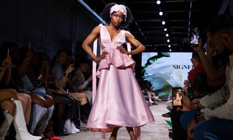 A model presents a creation at the 2024 Fashion Art Toronto's fashion week in Toronto, Canada, May 2, 2024. The fashion week kicked off here on Thursday and will last untill May 5. (Photo by Zou Zheng/Xinhua)