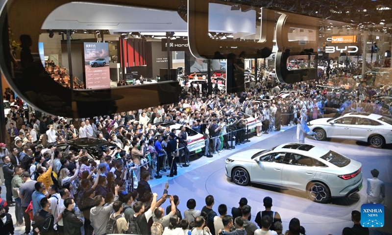 Visitors are seen at the exhibition area of Chinese NEV manufacturer BYD during the 2024 Beijing International Automotive Exhibition in Beijing,<strong></strong> capital of China, May 4, 2024. The exhibition closed on Saturday. Photo: Xinhua