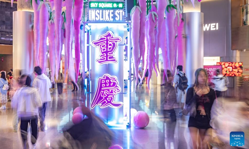 People visit a shopping mall in southwest China's Chongqing, May 4, 2024. Traffics have surged at tourist attractions throughout the country during the 5-day May Day holiday beginning on May 1. Photo: Xinhua