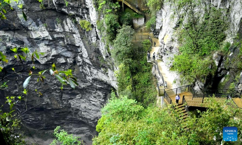 People visit a geological park in Xuanen County of Enshi Tujia and Miao Autonomous Prefecture, central China's Hubei Province, May 4, 2024. Traffics have surged at tourist attractions throughout the country during the 5-day May Day holiday beginning on May 1. Photo: Xinhua