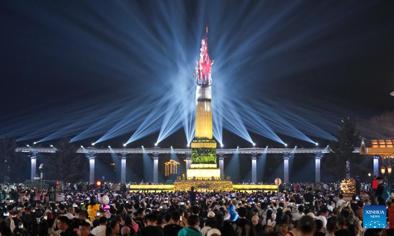 People watch a light show held at a square in Harbin, capital of northeast China's Heilongjiang Province, May 3, 2024. Photo: Xinhua