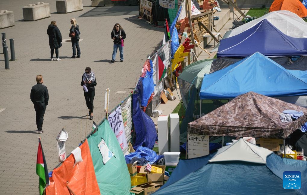 People are seen near an encampment on the Vancouver campus of the University of British Columbia in Vancouver, British Columbia, Canada, on May 6, 2024.(Photo: Xinhua)