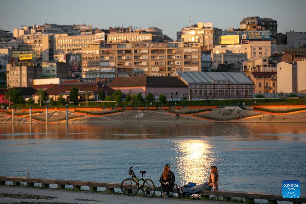 Women take a rest near the Sava River in Belgrade, Serbia, May 5, 2024.(Photo: Xinhua)