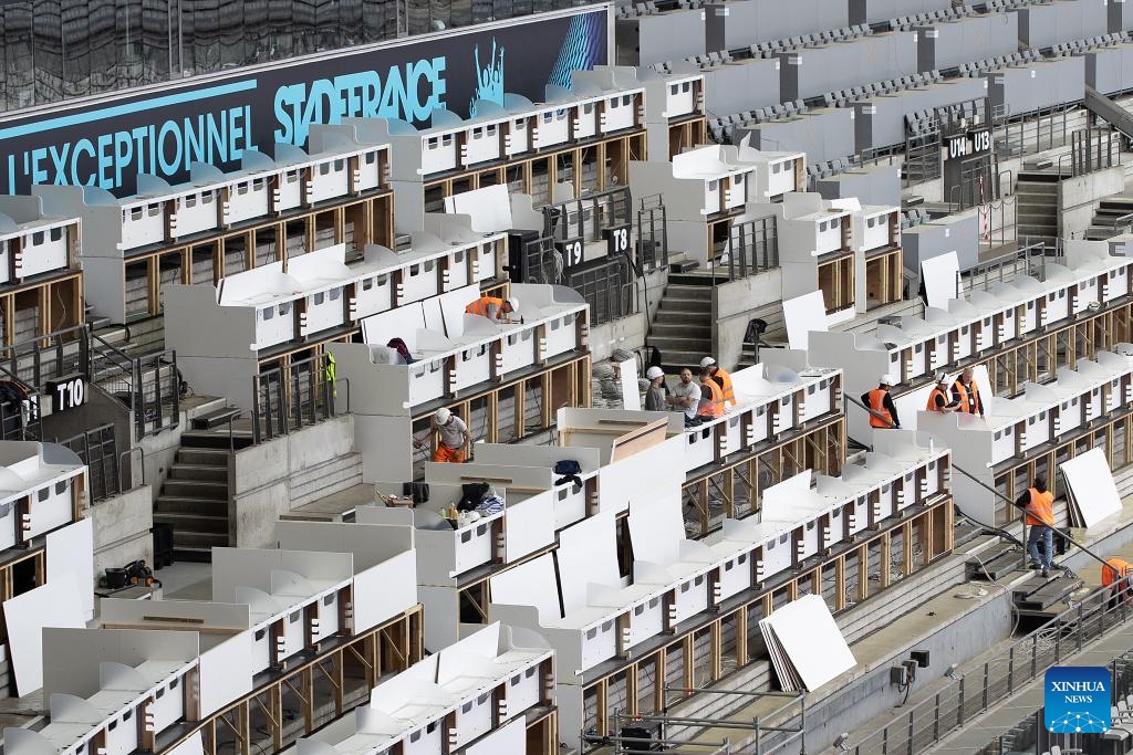 Workers work for the tribune of the Stade de France, in Paris, France, on May 7, 2024.(Photo: Xinhua)