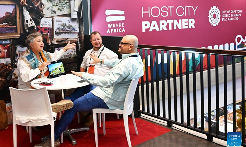 Participants talk during the We Are Africa travel show in Cape Town, South Africa, May 7, 2024. The annual We Are Africa travel show takes place at the Cape Town Stadium from May 6 to May 9.(Photo: Xinhua)