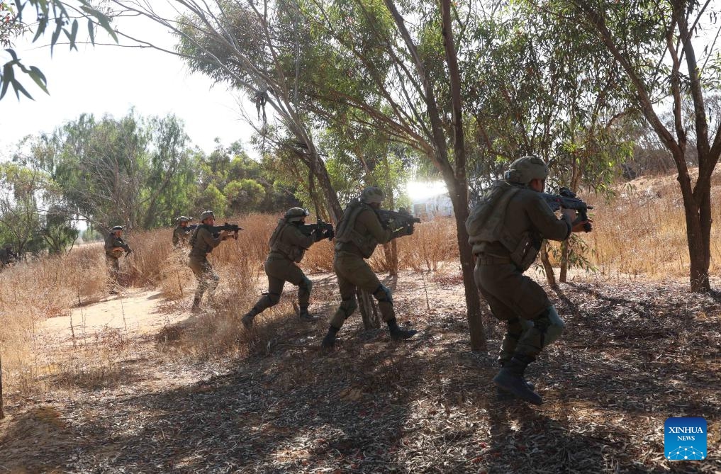 Israeli soldiers take part in a drill before entering Gazan city of Rafah near the Kerem Shalom crossing in Israel, on May 7, 2024.(Photo: Xinhua)