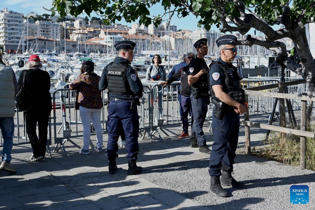 Policemen patrol before the arrival of the Olympic Flame at the old port in Marseille, southern France, May 8, 2024.(Photo: Xinhua)