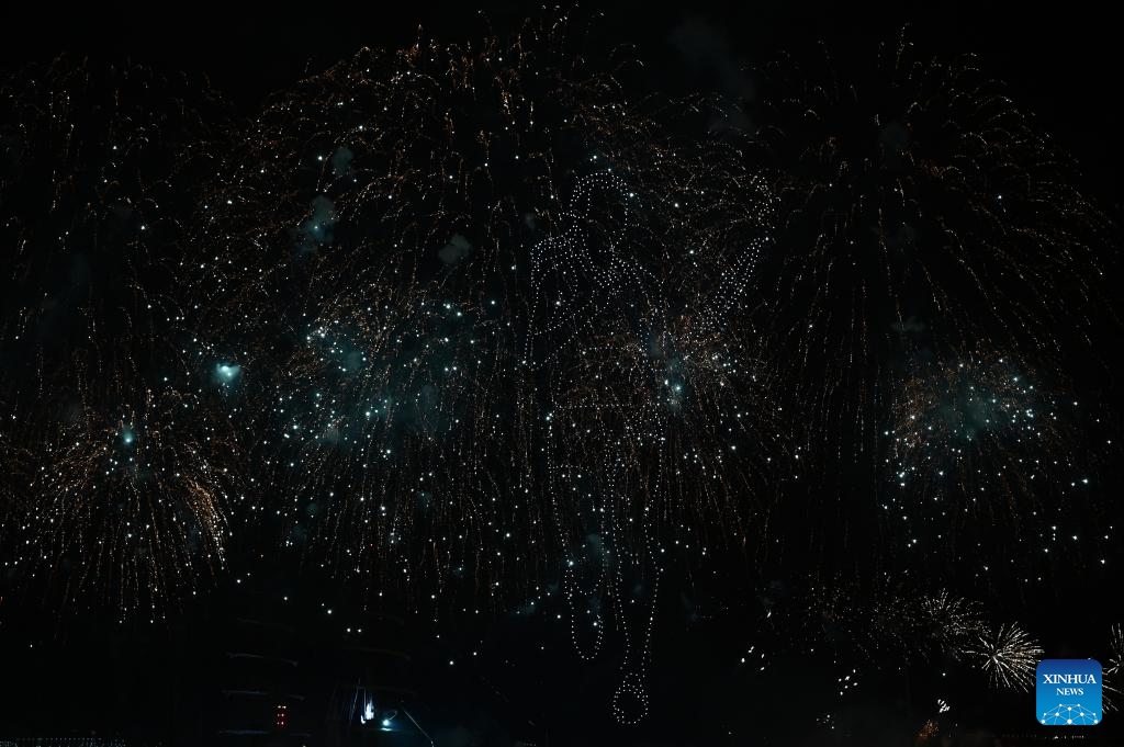 Fireworks and drone show are seen before the arrival of the Olympic Flame at the old port in Marseille, southern France at the night of May 7, 2024.(Photo: Xinhua)