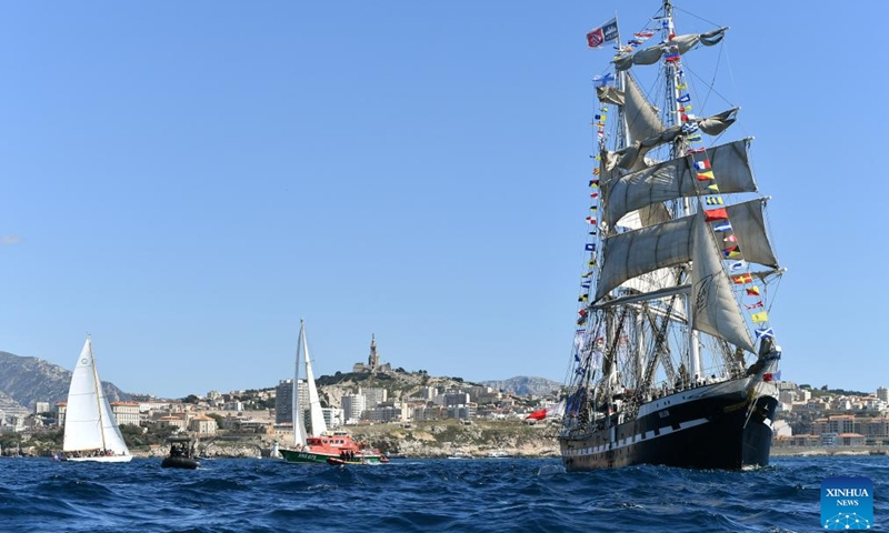 The Belem, a three-masted sailing ship carrying the Olympic flame, arrives in the southern French city of Marseille on May 8, 2024.(Photo: Xinhua)