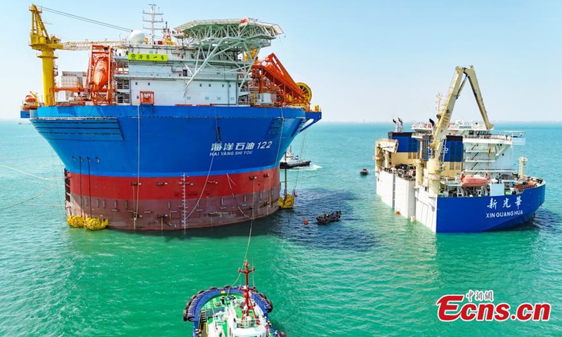 China's self developed cylindrical floating, production, storage and offloading (FPSO) facility, Haikui 1, sets sail from Qingdao, east China's Shandong Province, May 12, 2024. Photo provided to China News Service