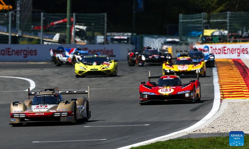 The #12 Hertz Team Jota's British drivers Will Stevens and Callum Ilott drive Porsche 963 (front L) during the Hypercar category race at the 2024 FIA World Endurance Championship (WEC) at Circuit de Spa-Francorchamps in Stavelot, Belgium, May 11, 2024. Photo: Xinhua