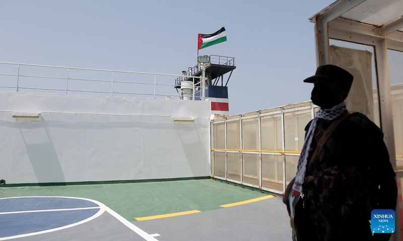 A Houthi group member stands on the deck of the Galaxy Leader near the port city of Hodeidah in western Yemen, May 12, 2024. A delegation from the International Committee of the Red Cross (ICRC) visited on Sunday the Galaxy Leader, a vehicle carrier hijacked by the Houthi group, and met with its crew near the port city of Hodeidah in western Yemen. Photo: Xinhua