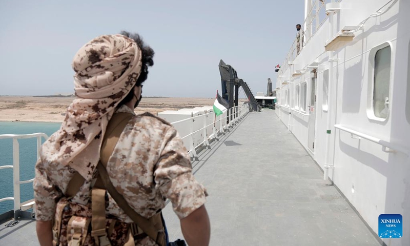 A Houthi group member stands on the deck of the Galaxy Leader near the port city of Hodeidah in western Yemen, May 12, 2024. A delegation from the International Committee of the Red Cross (ICRC) visited on Sunday the Galaxy Leader, a vehicle carrier hijacked by the Houthi group, and met with its crew near the port city of Hodeidah in western Yemen. Photo: Xinhua