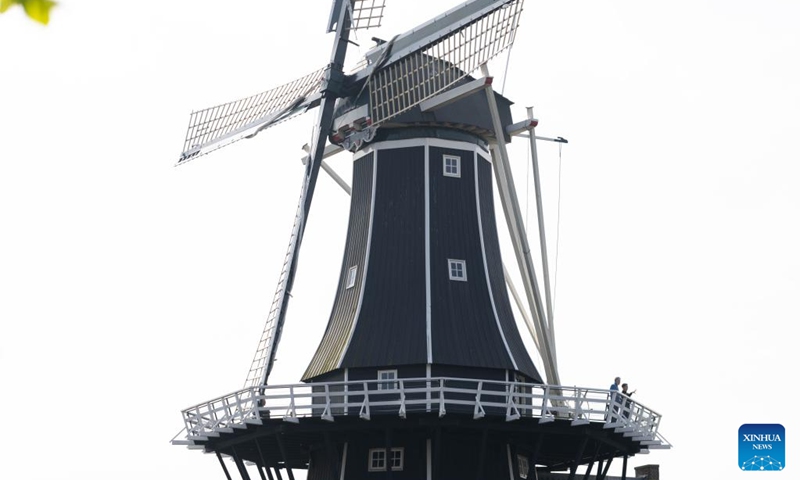 People visit the De Adriaan windmill during the National Mill Day celebration in Haarlem, the Netherlands, May 11, 2024. The National Mill Day is celebrated annually on the second weekend in May. Photo: Xinhua