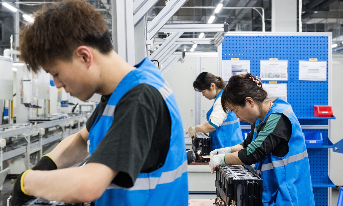 Production line workers in SinoEV (Hefei) Powertrain Technologies Co in Hefei, East China's Anhui Province on April 15, 2024 Photo: Chen Tao/GT

