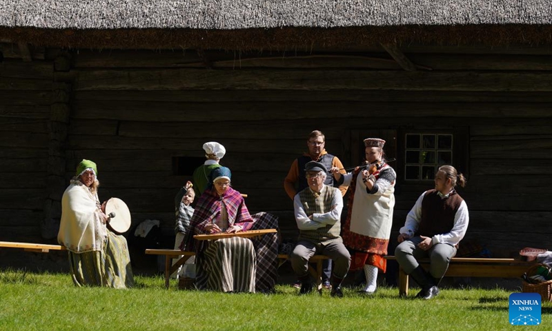 Artists perform during a celebration at the Ethnographic Open-Air Museum of Latvia, in Riga, Latvia, on May 11, 2024. Covering about 87 hectares, this biggest open-air museum in Latvia held its centennial celebration on Saturday. Photo: Xinhua