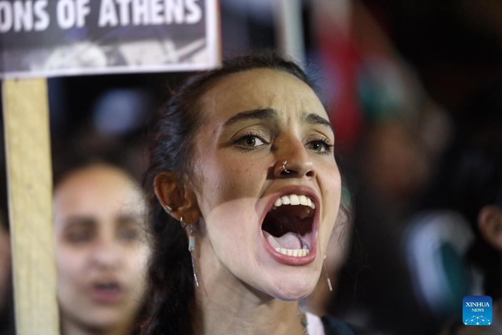 A student shouts slogans during a protest against the war in Gaza Strip, in Athens, Greece, on May 13, 2024.(Photo: Xinhua)