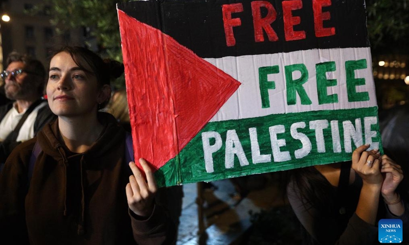 Students take part in a protest against the war in Gaza Strip, in Athens, Greece, on May 13, 2024.(Photo: Xinhua)