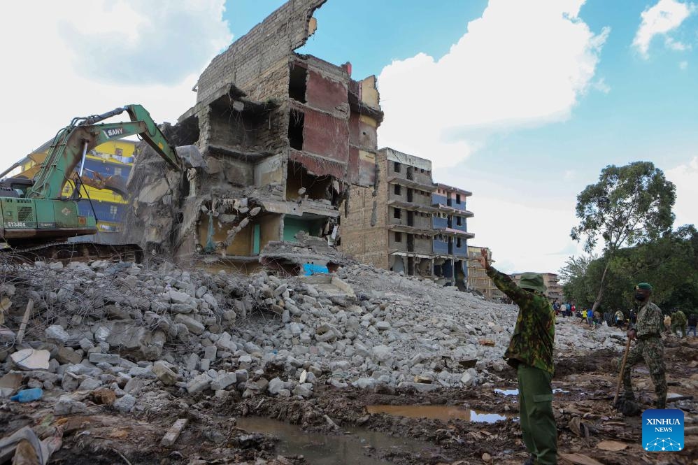 Rescuers work at the site where a residential building collapsed in the Kiamaiko area in Nairobi, Kenya, on May 14, 2024. Four people were rescued from the rubble of a collapsed residential building on Tuesday in the Kiamaiko area, a police officer said.(Photo: Xinhua)