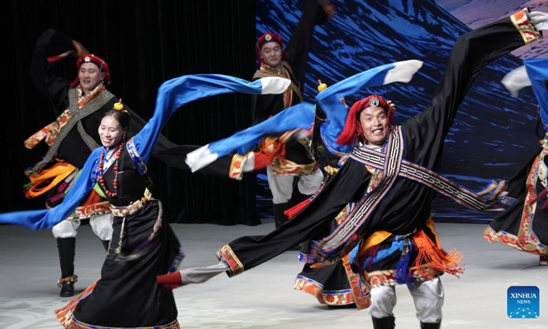 Actors from Yushu Tibetan Autonomous Prefecture of northwest China's Qinghai Province perform in Beijing, capital of China on May 13, 2024. Thirty actors, all of them career farmers and herders, presented 10 shows, including dance, chorus and short plays here on Monday night.(Photo: Xinhua)