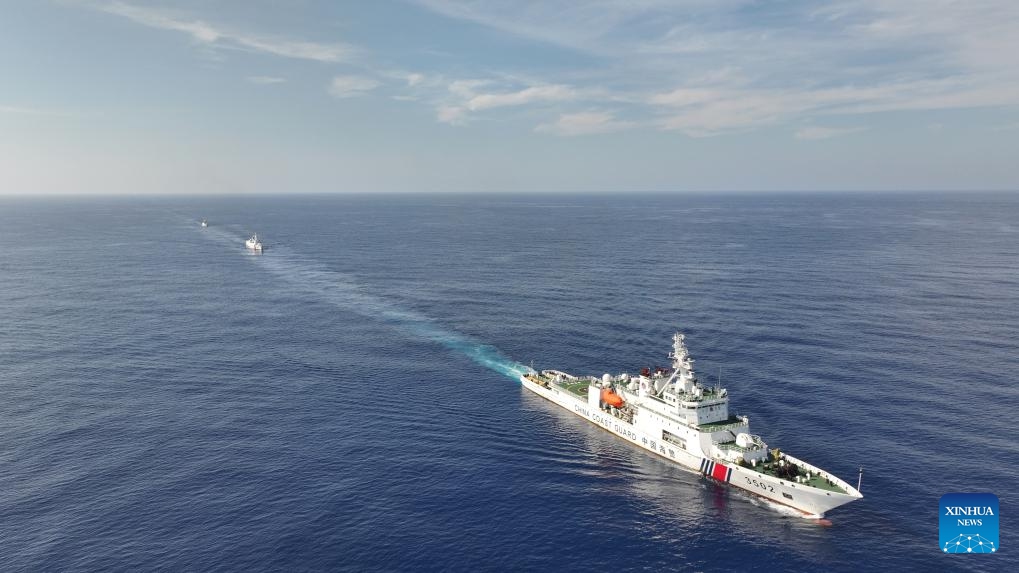 An aerial drone photo taken on May 12, 2024 shows vessels of the China Coast Guard (CCG) sailing during a training in the South China Sea. The CCG conducted a regular training during operations of rights protection and law enforcement in the waters of Huangyan Dao.(Photo: Xinhua)